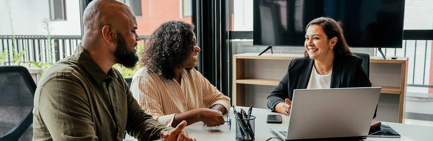 Housing officer speaking to, two tenants
