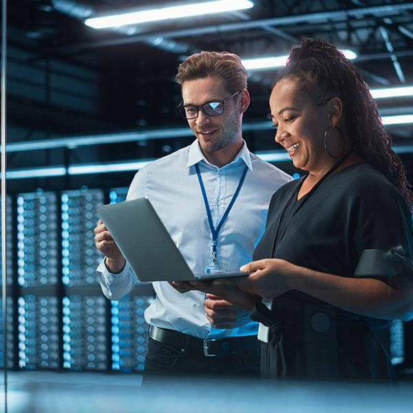 IT colleagues working together on a project