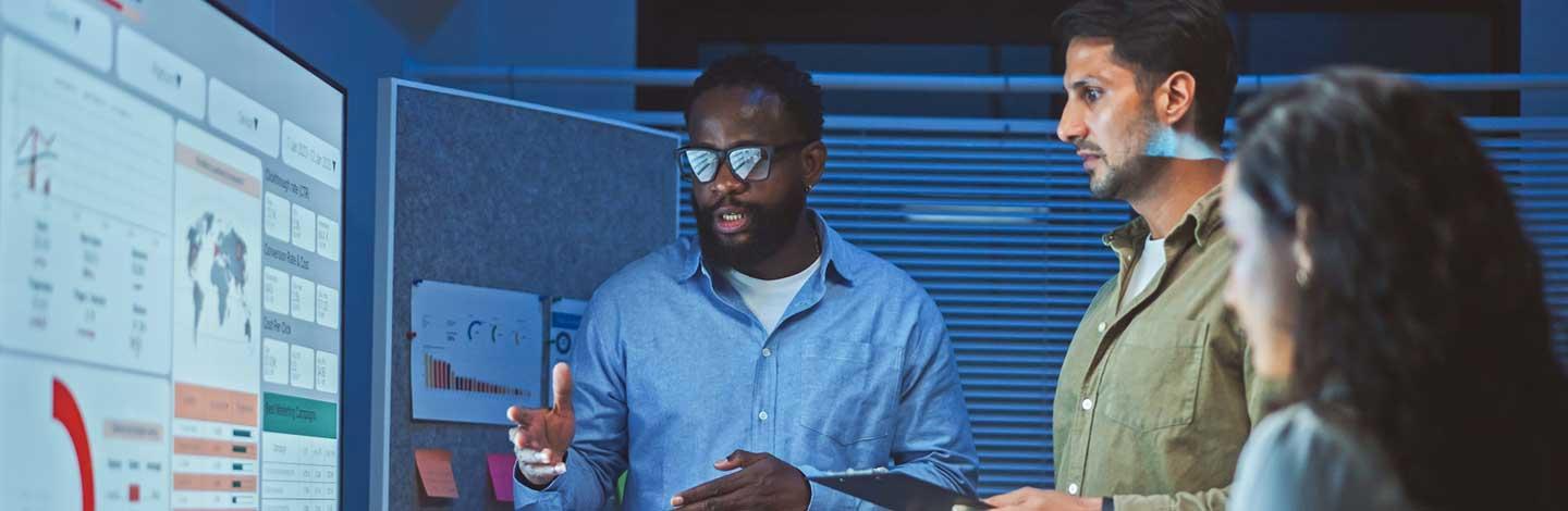 Colleagues talking and working a part of an RPO